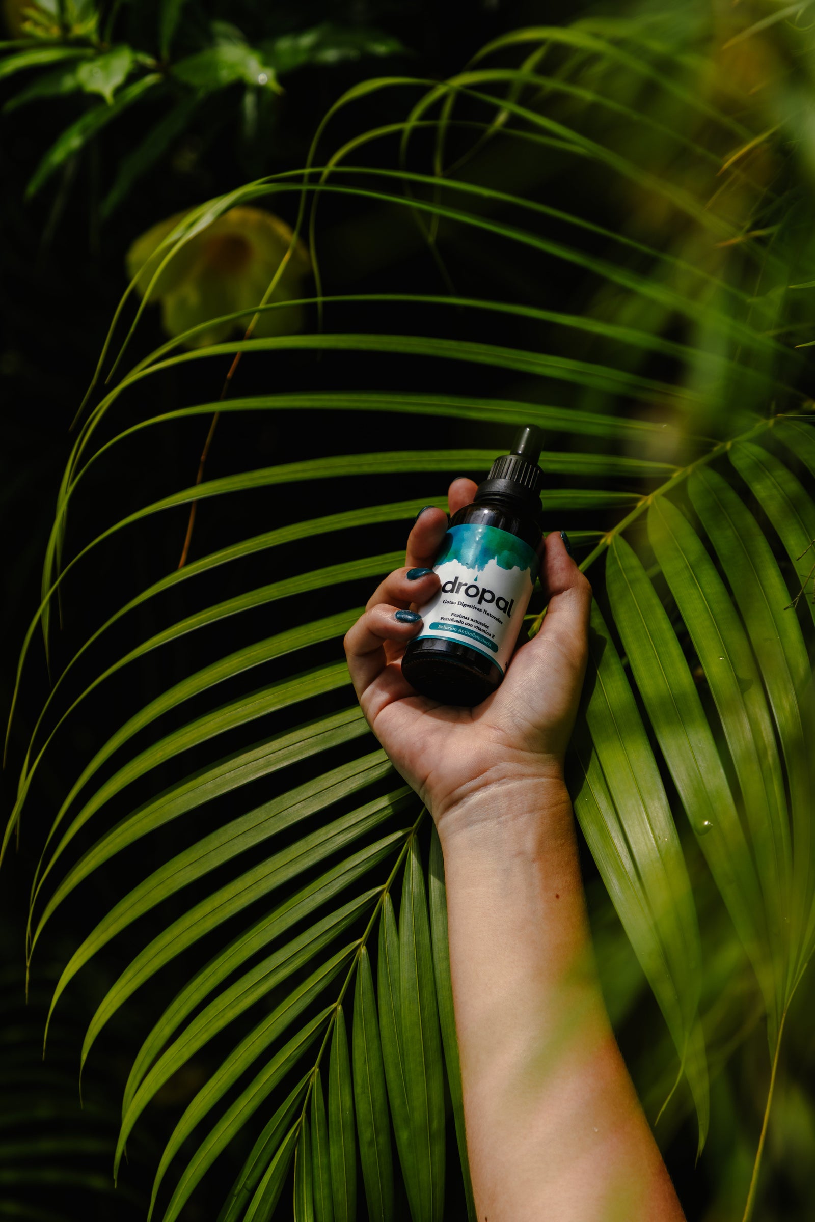 Dropal bottle in botanical setting